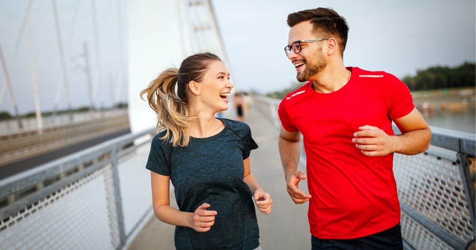 man and woman jogging